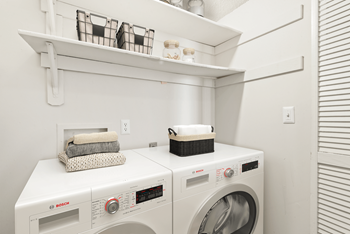 A laundry room with a washer and dryer